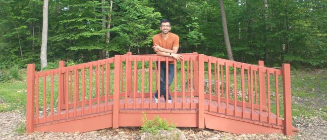 I stand in the middle of a bridge. I'm not sure which side I used to walk on nor which side I used to walk off.